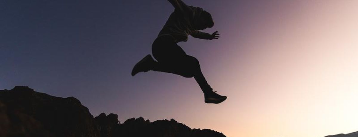jumping sunset