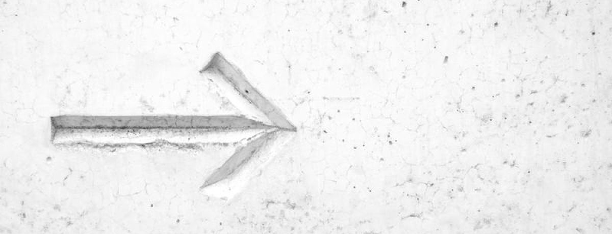 arrow in the white sand