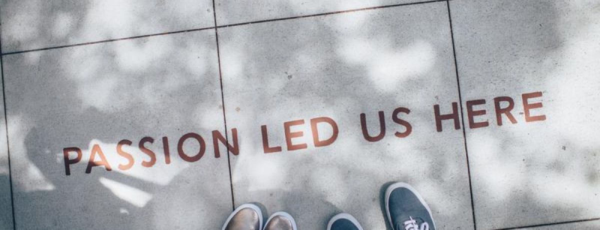 passion led us here, sign with feet