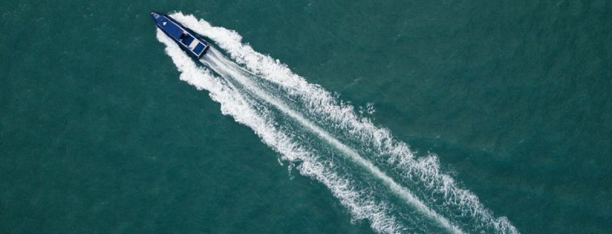 Boat Moving Across Water