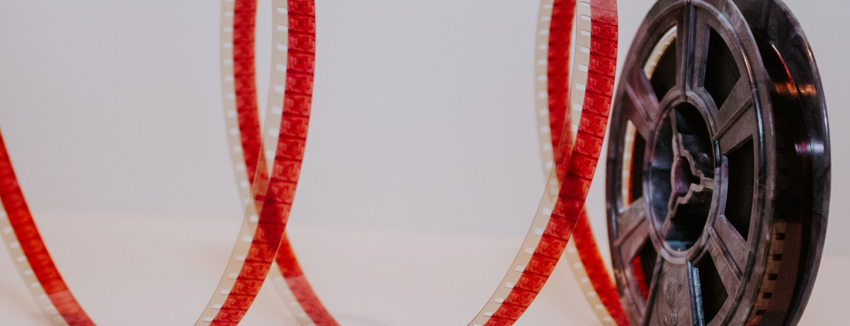 Movie Reel with red film strung out