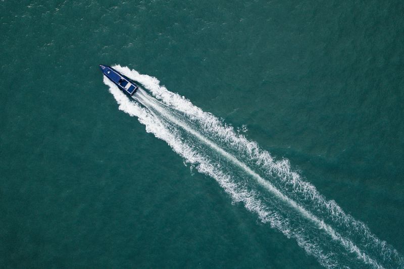 Boat Moving Across Water