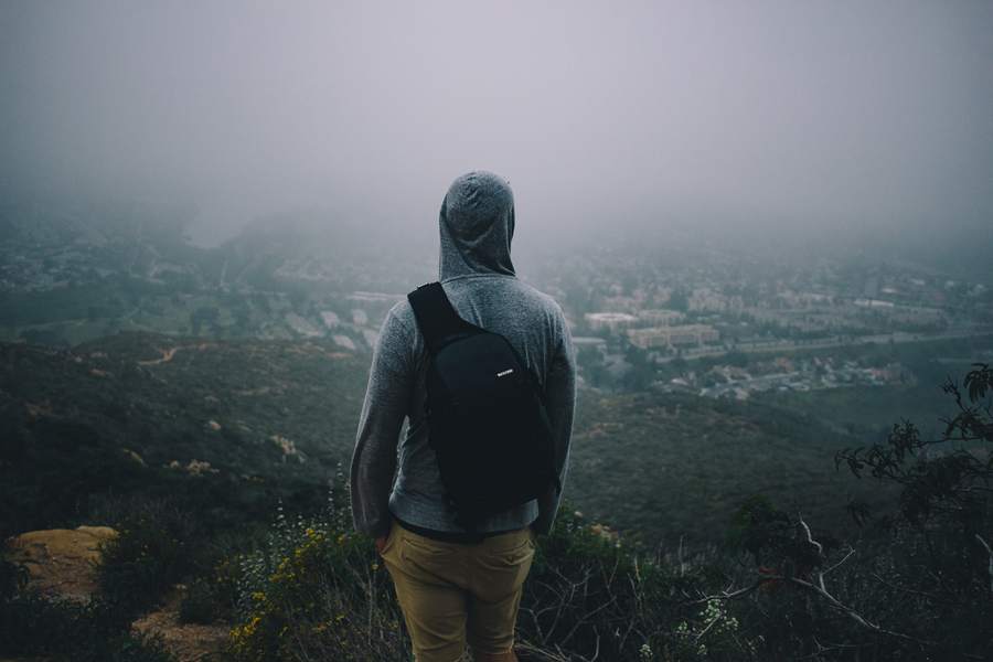 Man Looking Out Onto The Horizon