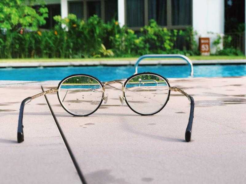 Photo of Glasses and swimming pool