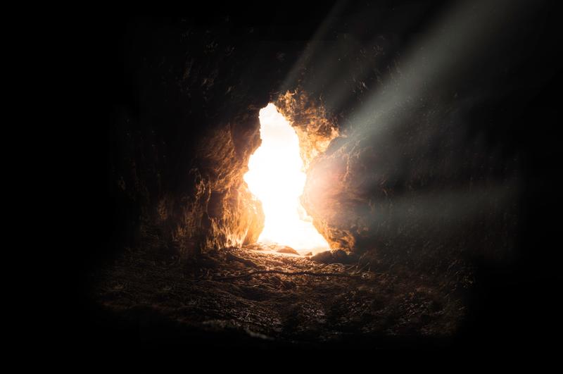 Bright Light Shining Through Cave Opening