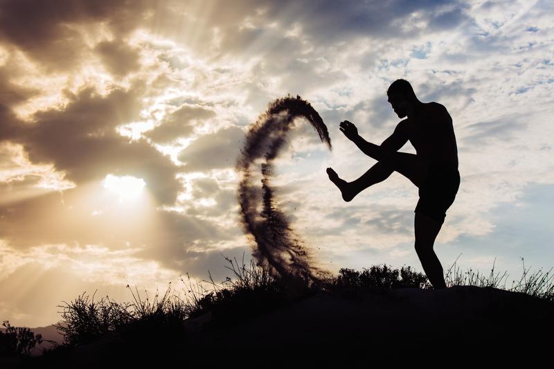 Shadow Man Kicking Dirt In The Air