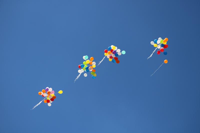 Balloons releasing to the sky