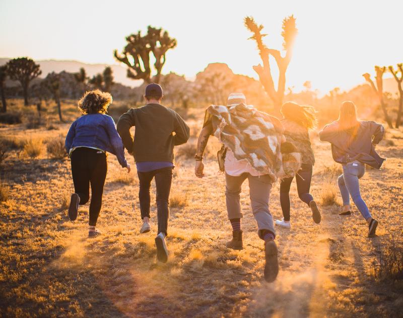 group of people running outdoors