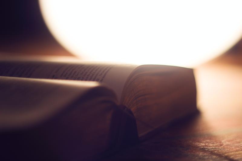 light shining on a Bible