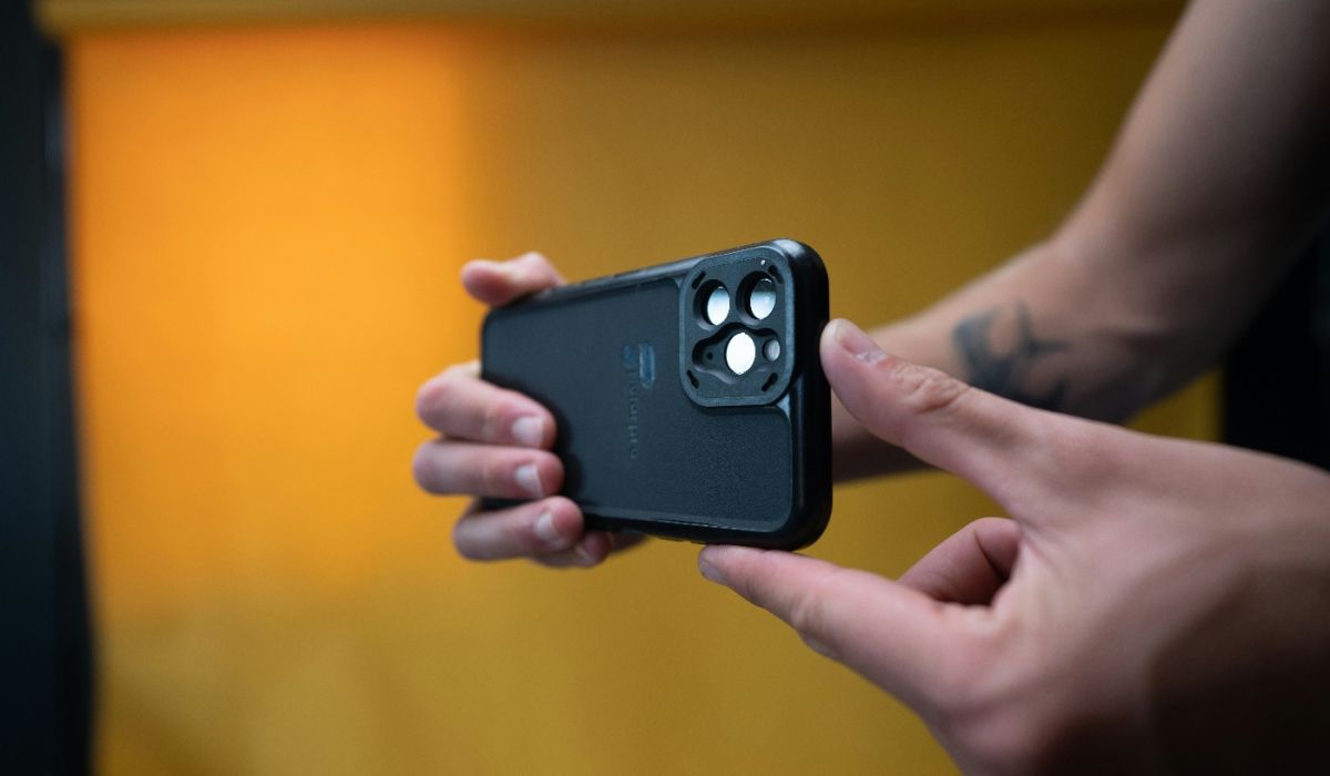 person using phone to record a video