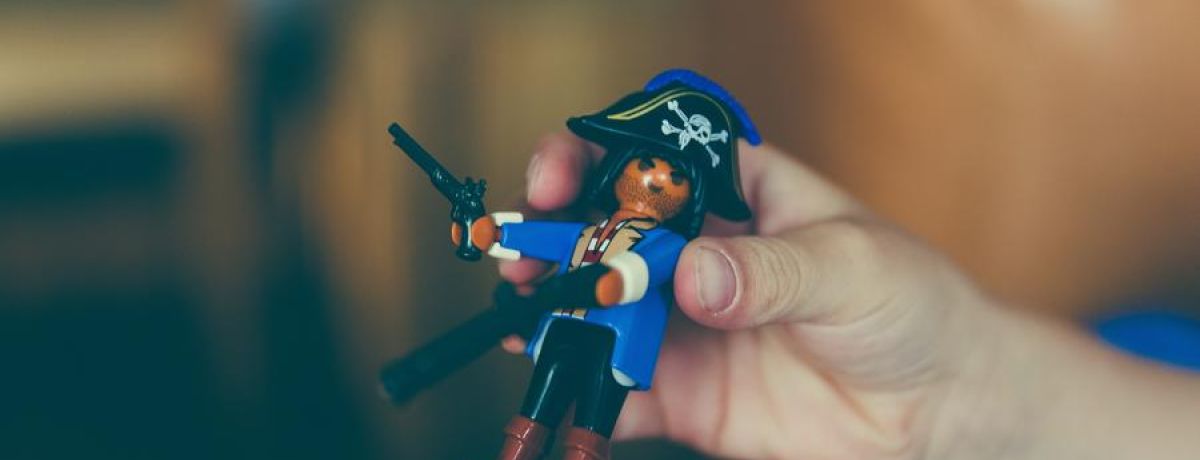 Pirate Toy In The Hands Of A Boy