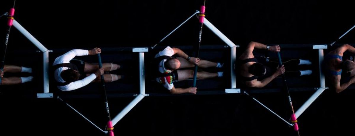 team working together to row the boat