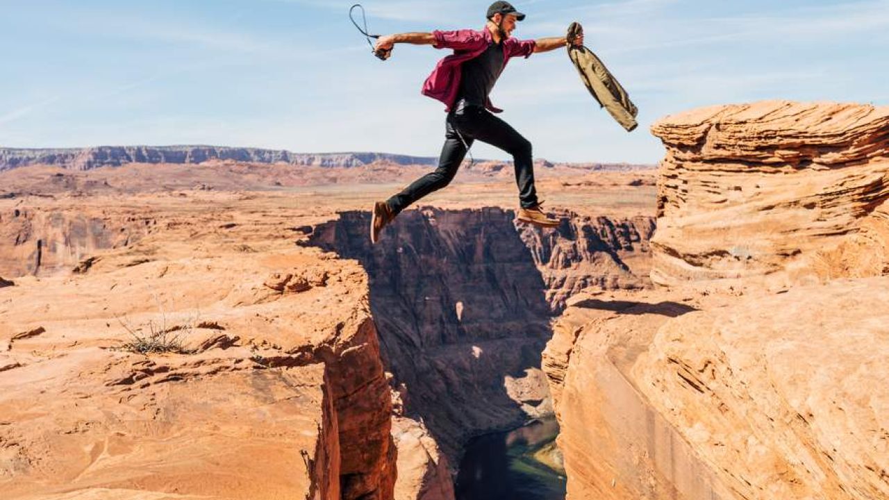 jumping over a canyon