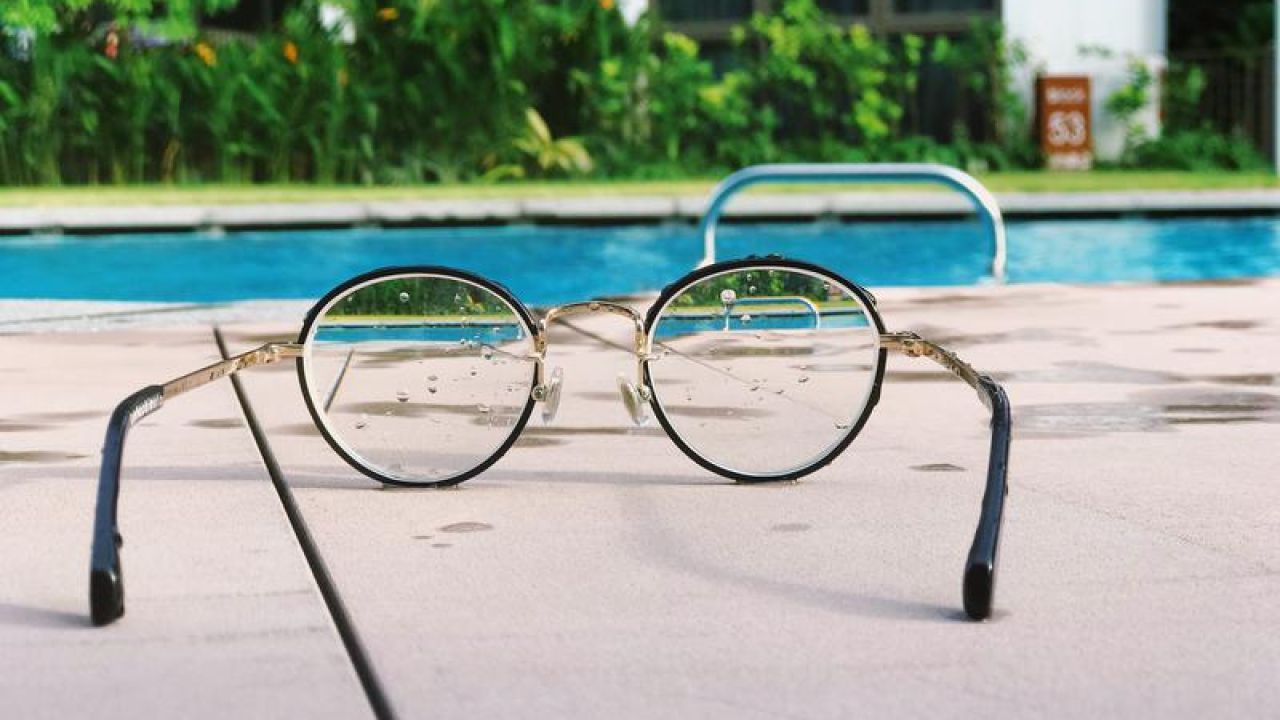Photo of Glasses and swimming pool