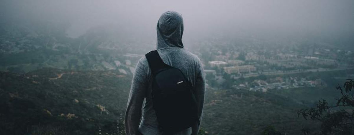 Man Looking Out Onto The Horizon