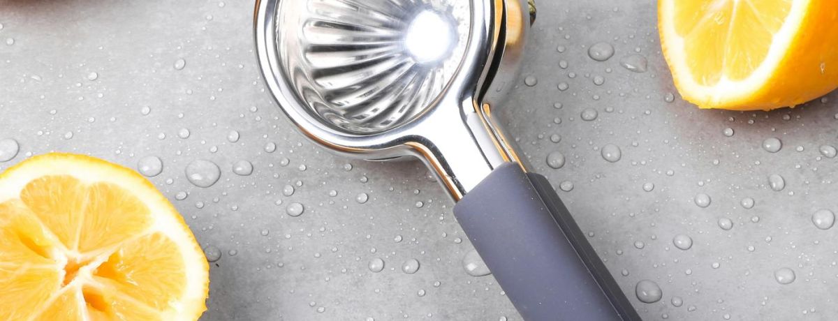 orange squeezer on table