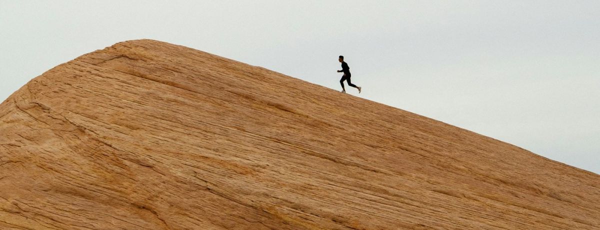 running outdoors on a sandstone mountain, valley of fire