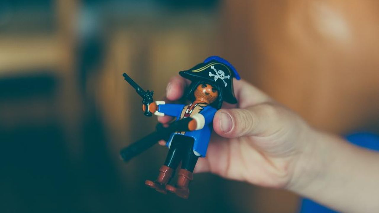 Pirate Toy In The Hands Of A Boy