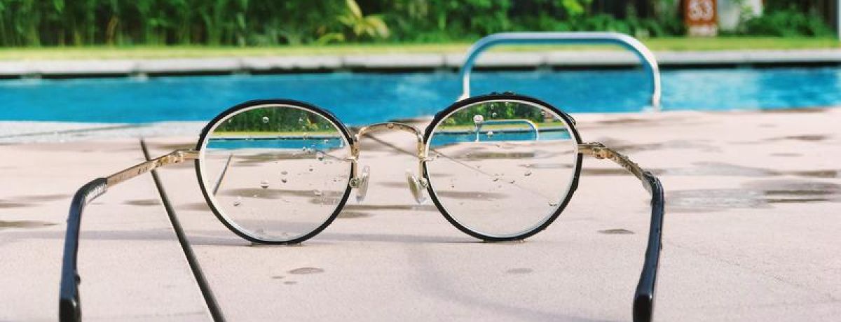 Photo of Glasses and swimming pool