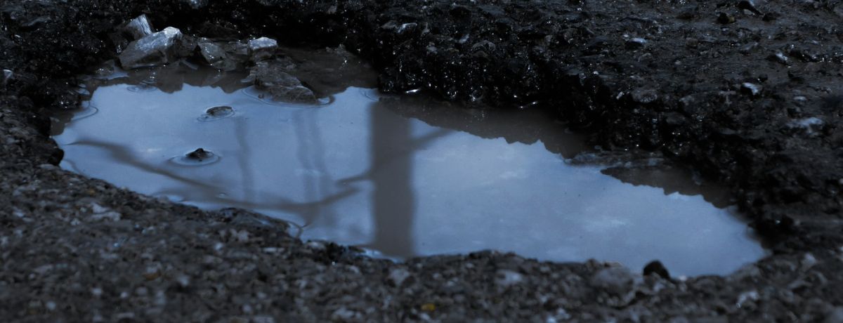 pothole with water