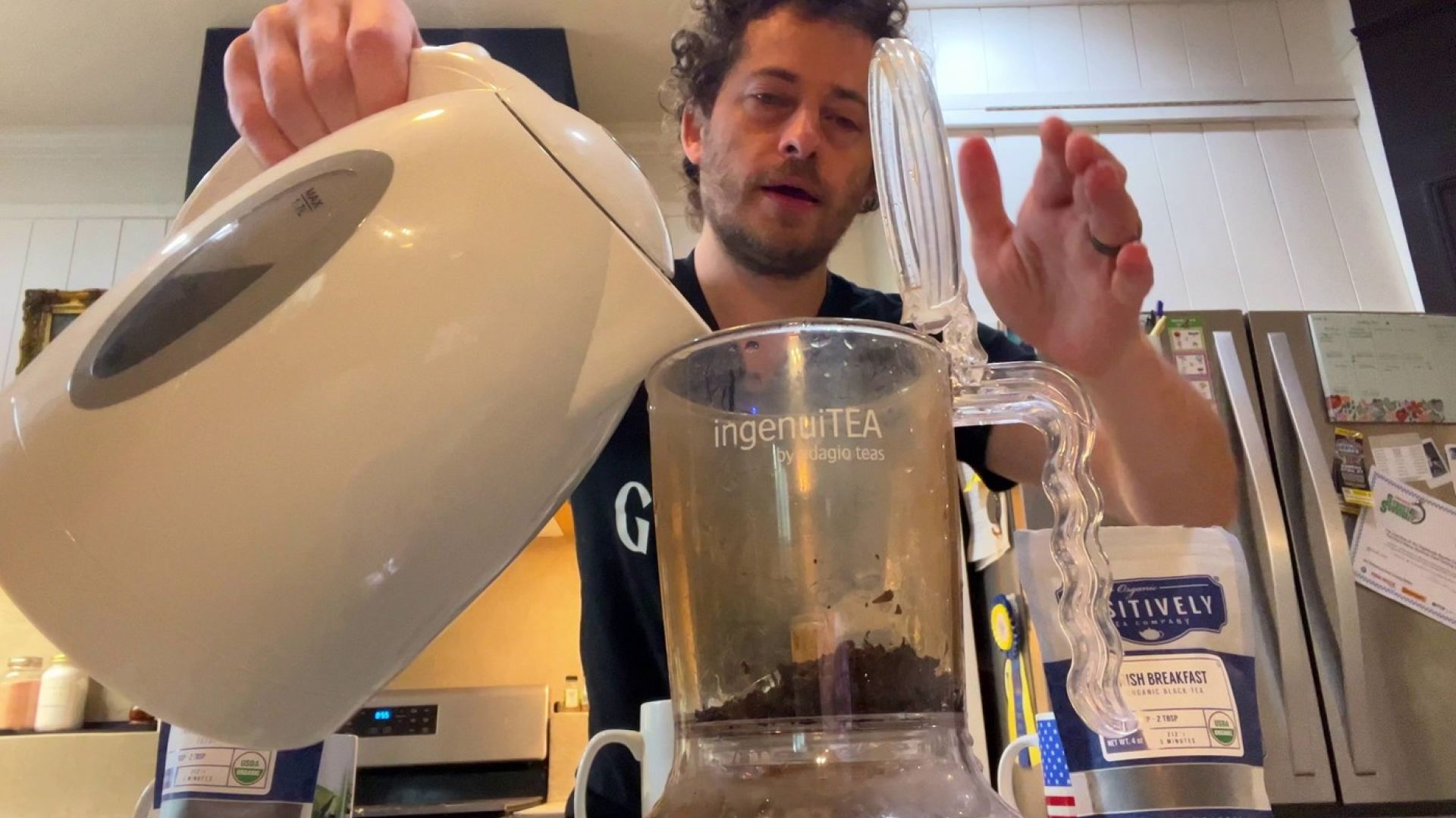 jason montoya, pouring hot water into tea infuser