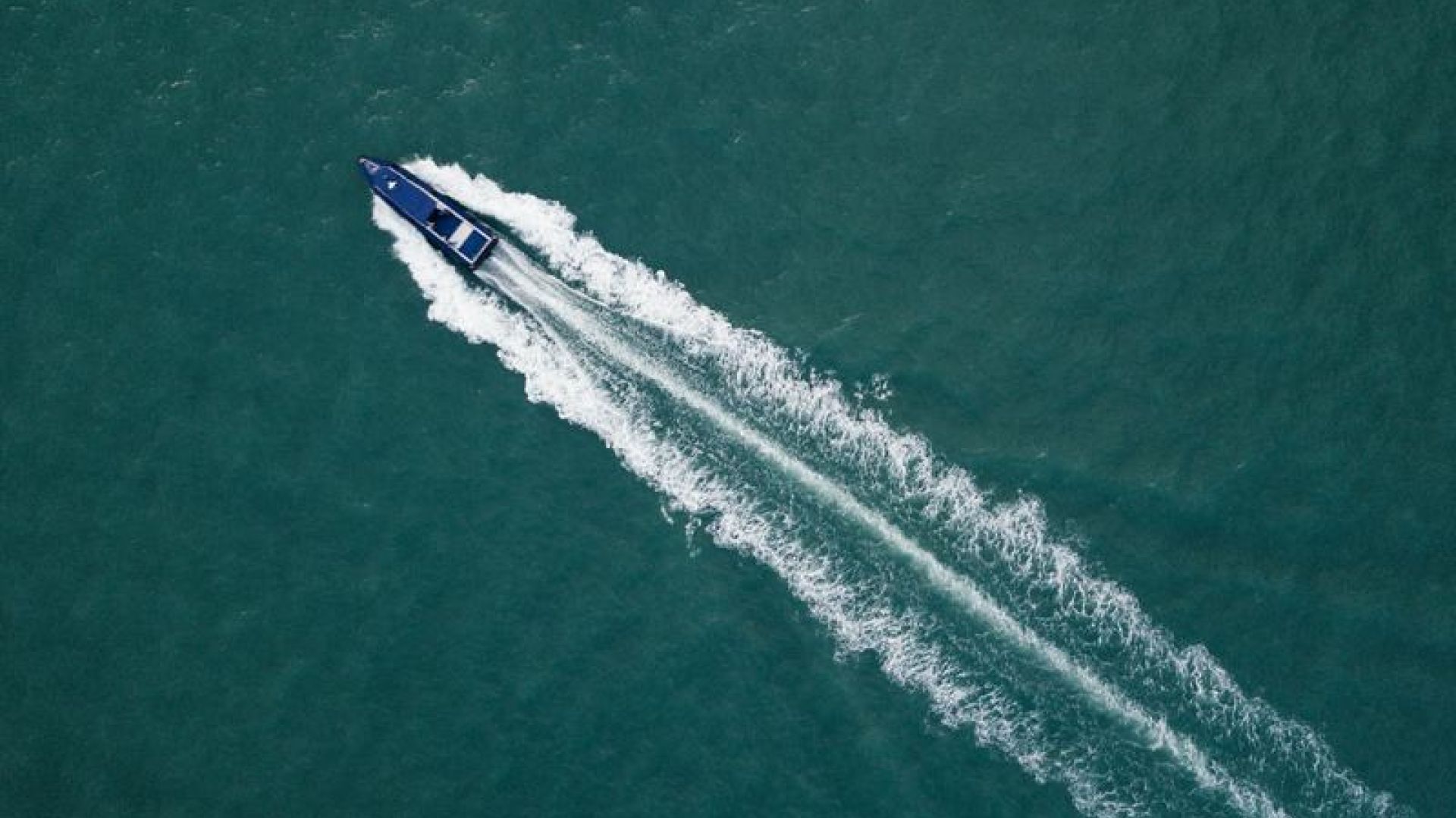Boat Moving Across Water