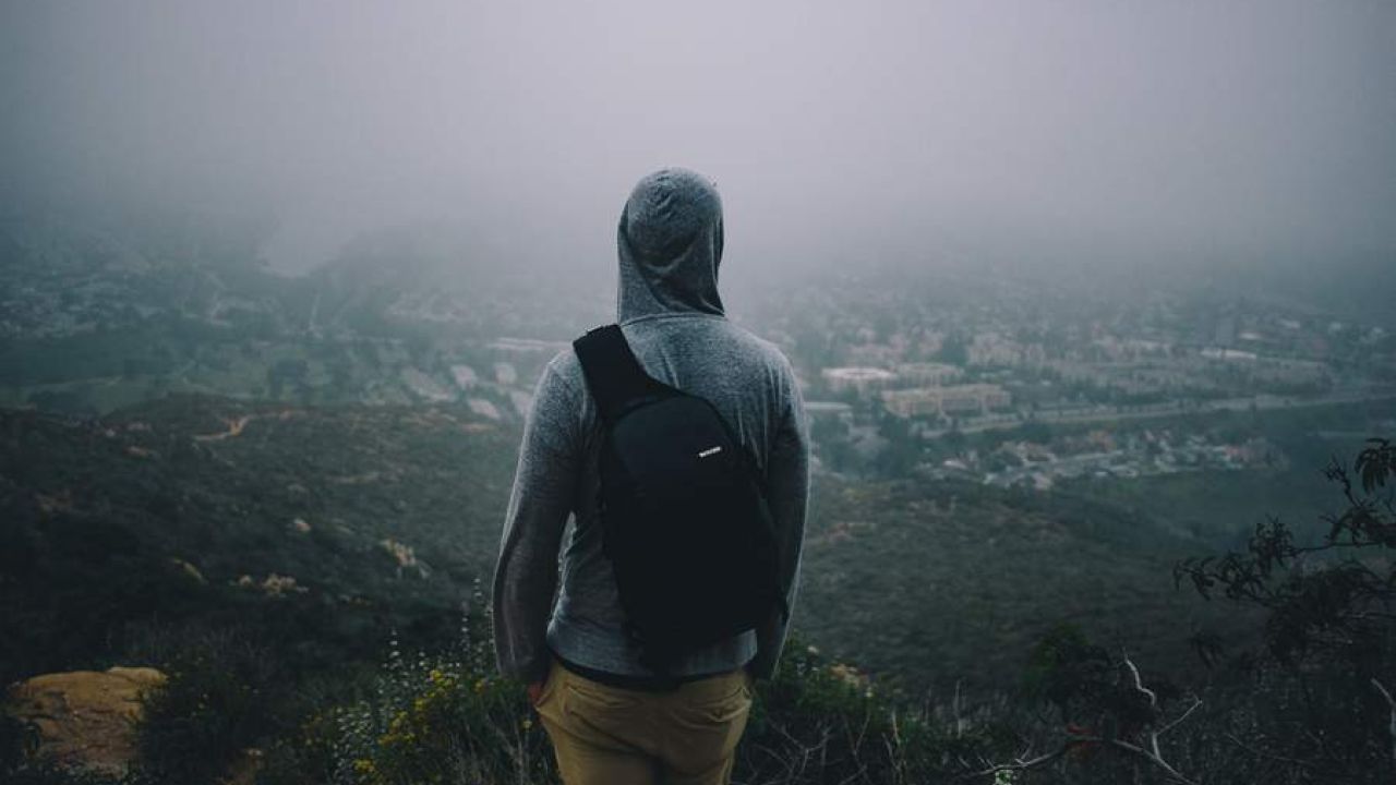 Man Looking Out Onto The Horizon