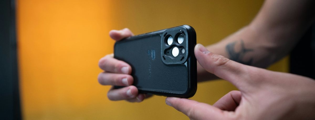 person using phone to record a video