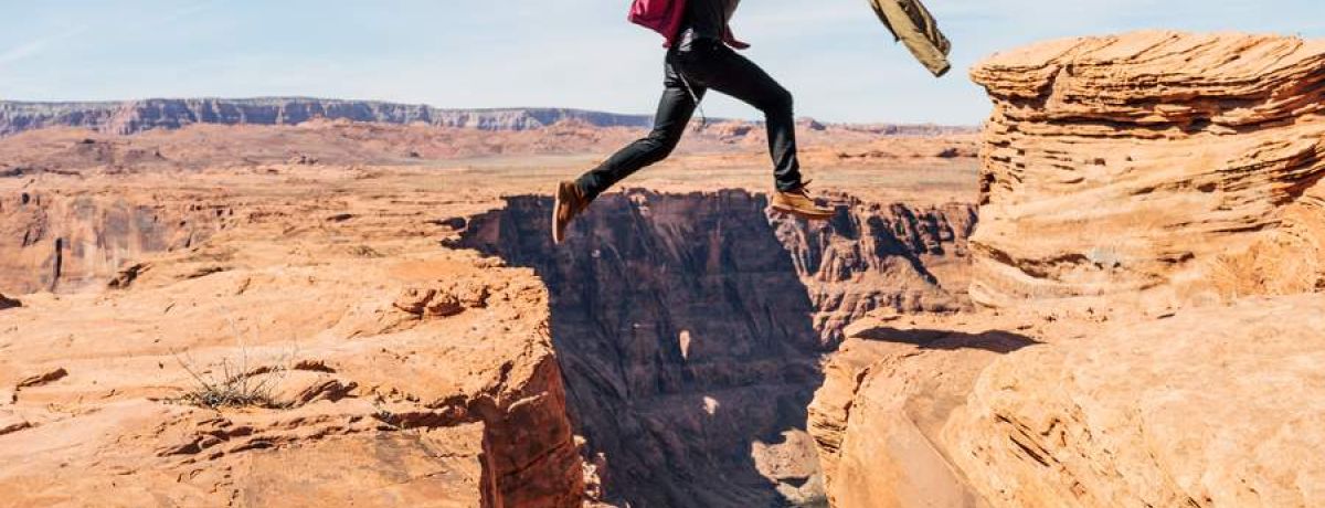 jumping over a canyon