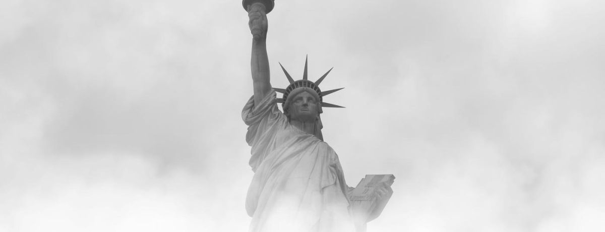 statue of libery in the fog