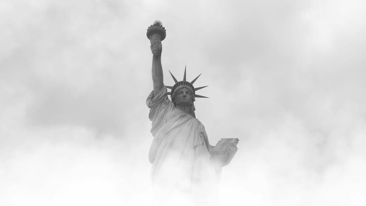 statue of libery in the fog