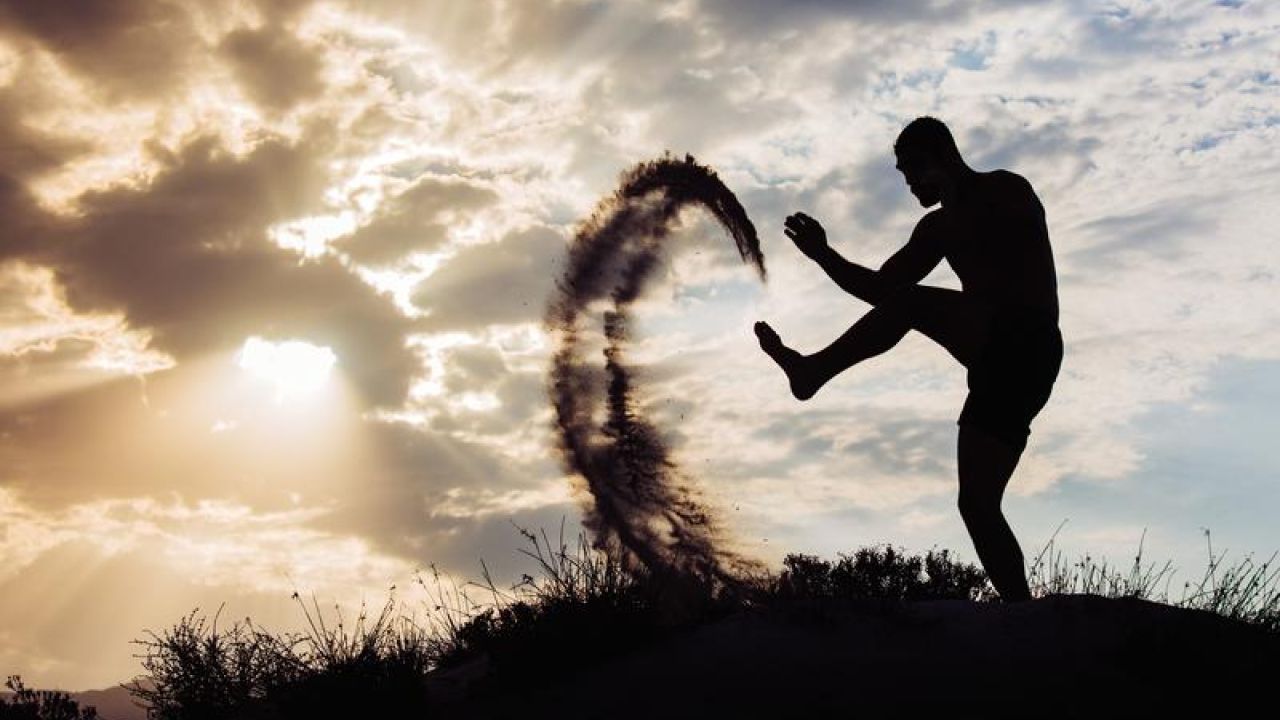 Shadow Man Kicking Dirt In The Air