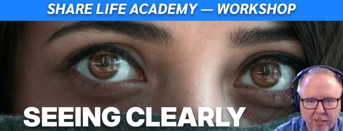 Woman looking at the camera with a face covering