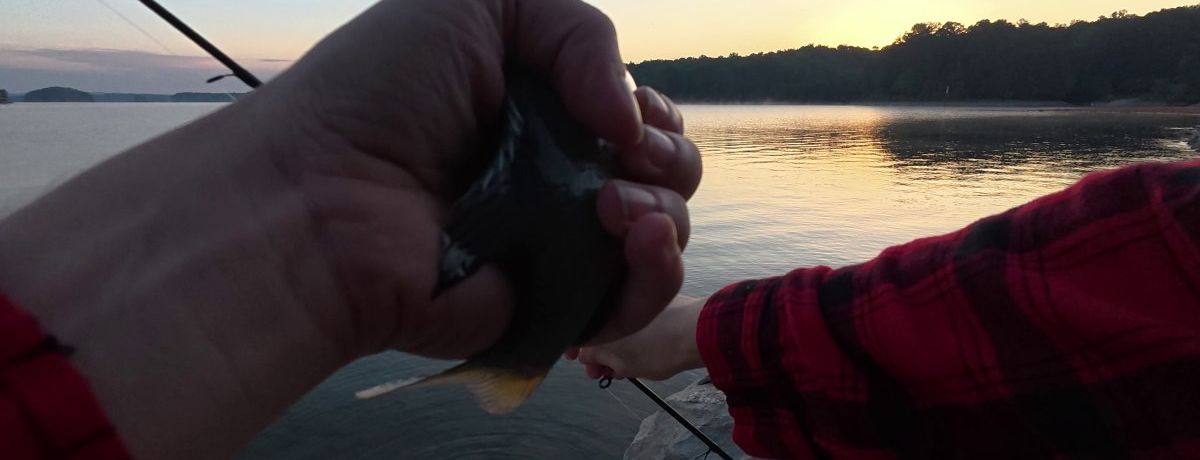 holding a fish, saddle dike 3