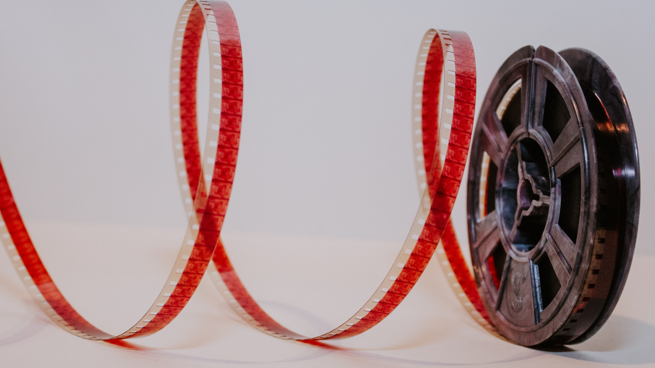 Movie Reel with red film strung out