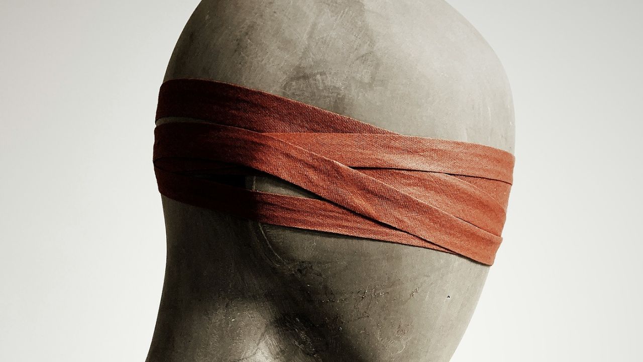 blind folded mannequin