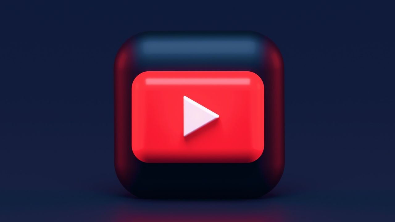 youtube icon, red play button, indoors
