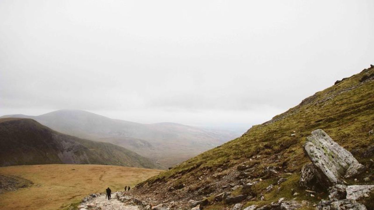 hiking on a trail up a mountain