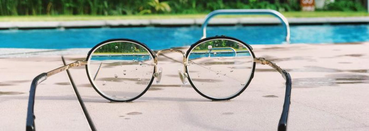 Photo of Glasses and swimming pool