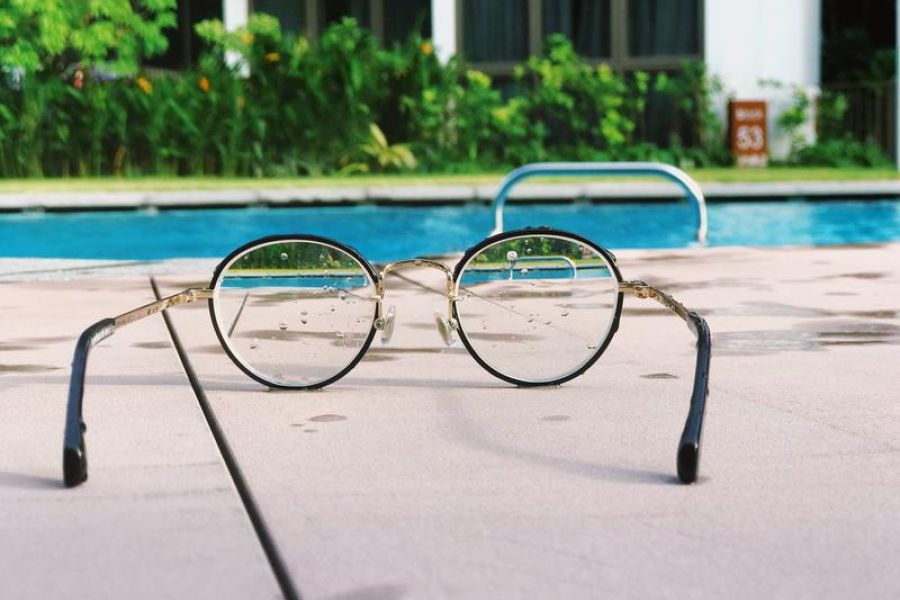 Photo of Glasses and swimming pool