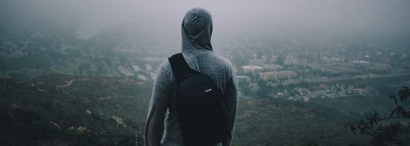 Man Looking Out Onto The Horizon