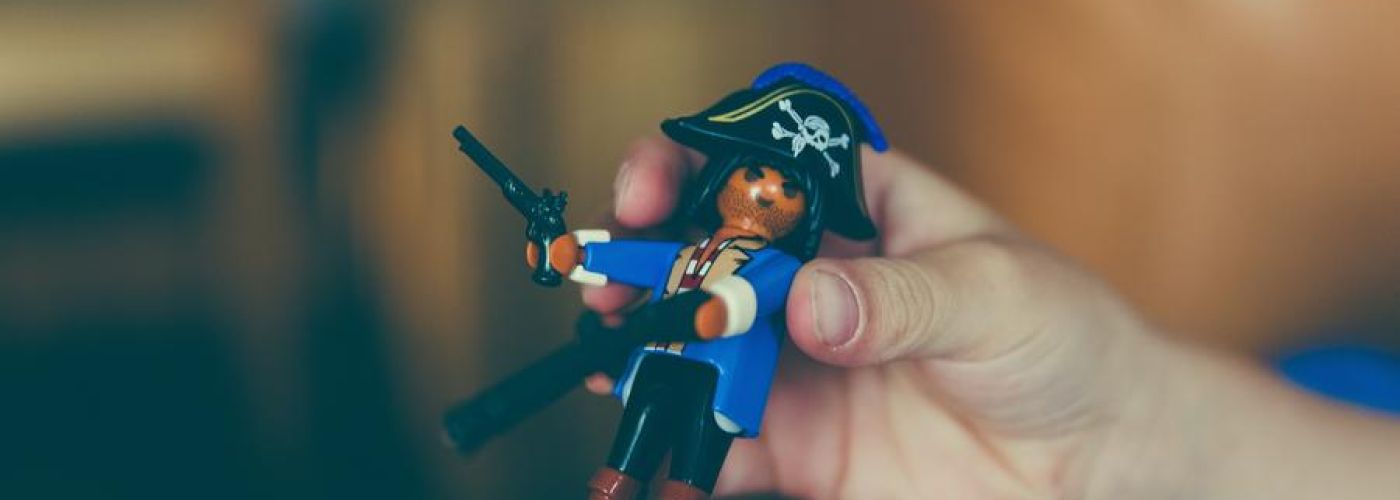 Pirate Toy In The Hands Of A Boy