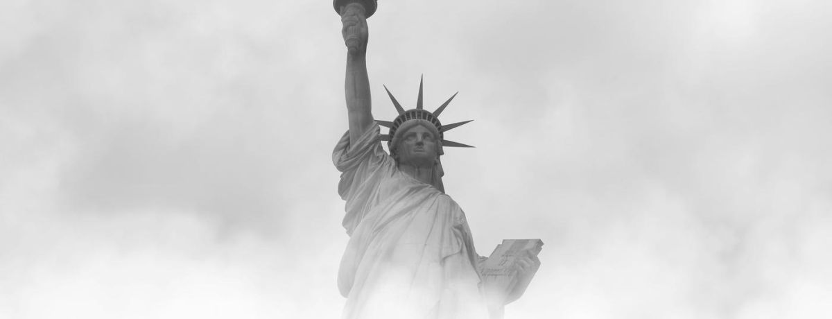 statue of libery in the fog