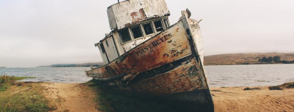 Beached Boat | Sandbar near water