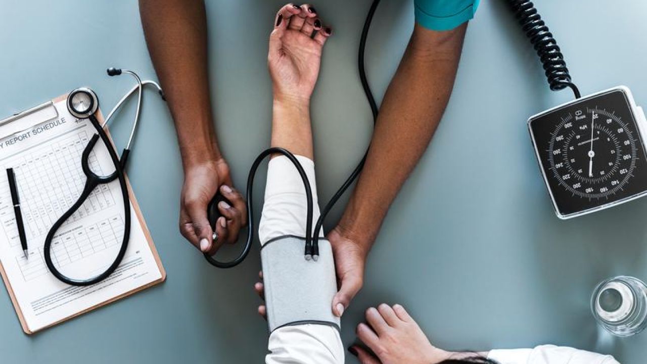 Person Checking a Pulse