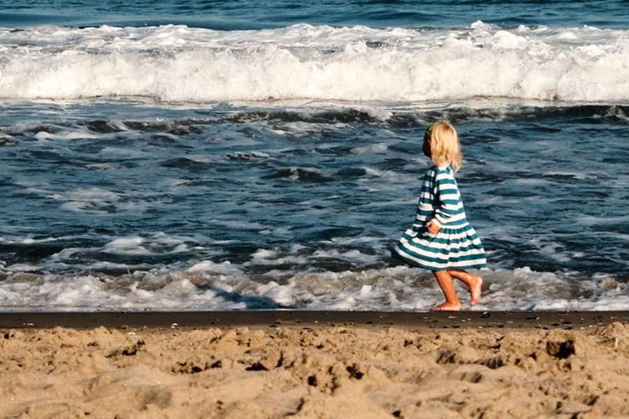 girl on the ocean looking out