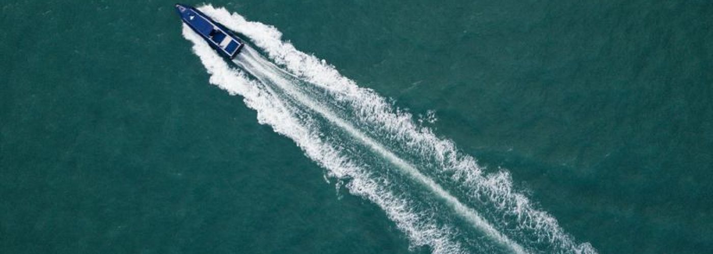 Boat Moving Across Water