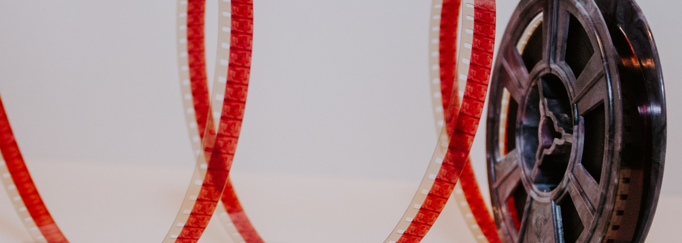 Movie Reel with red film strung out